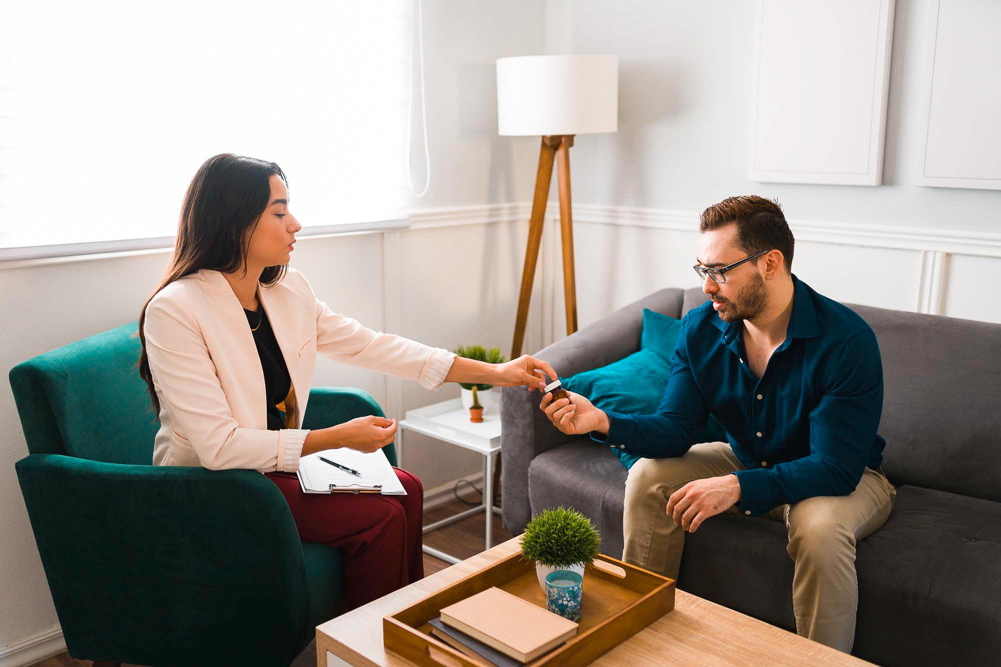 man talking with therapist about anxiety