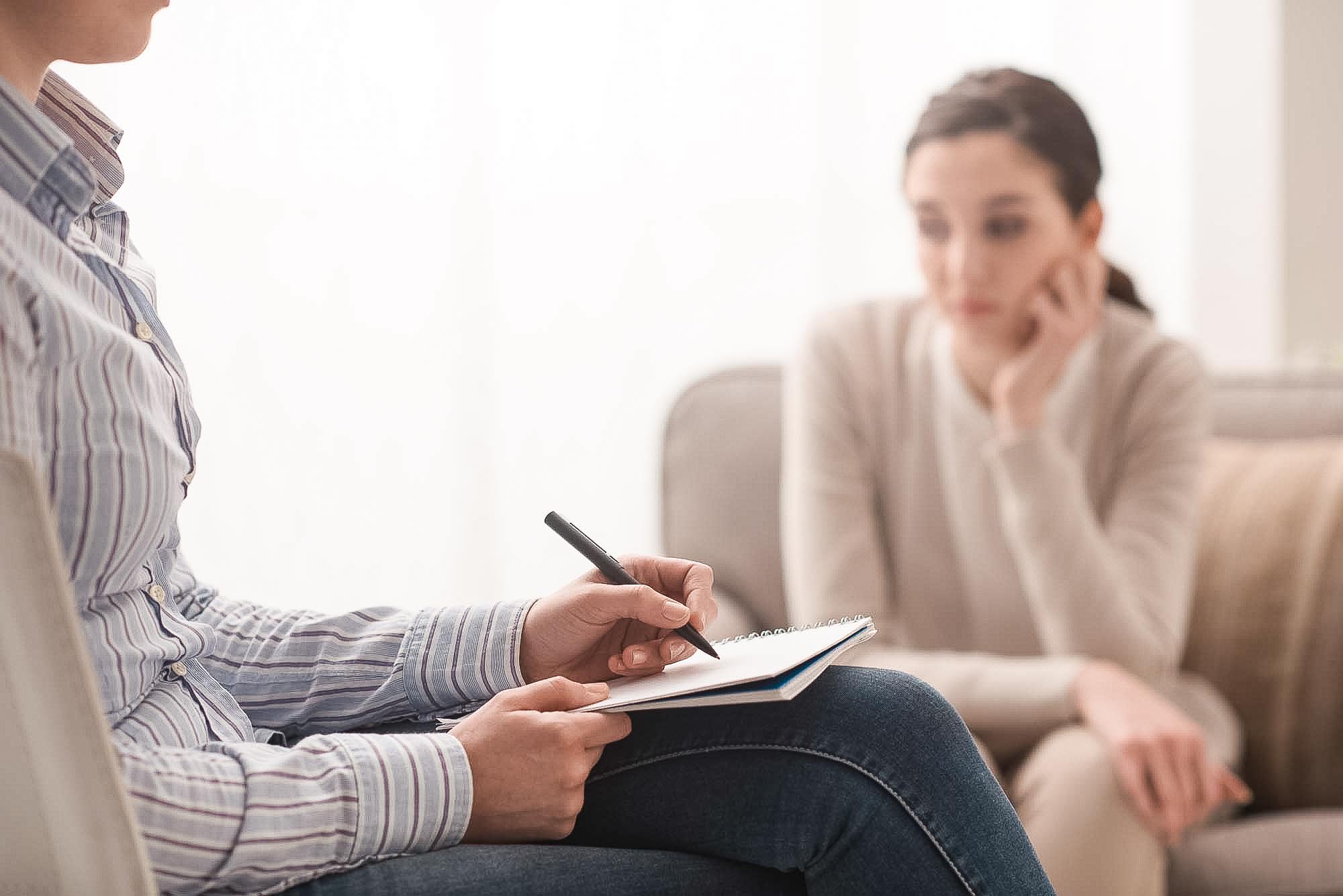 Psychologist listening to her patient