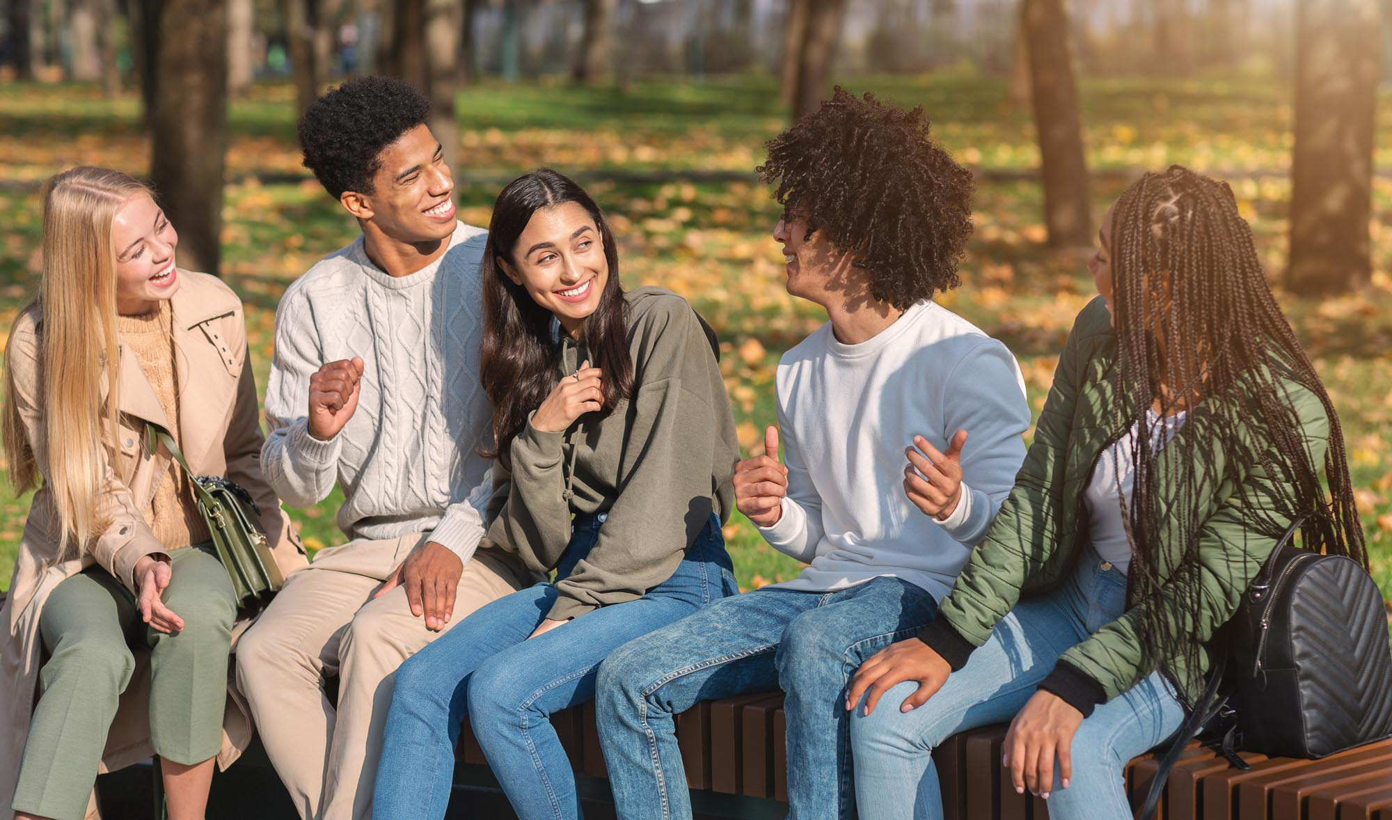 Group of young adults talking outside