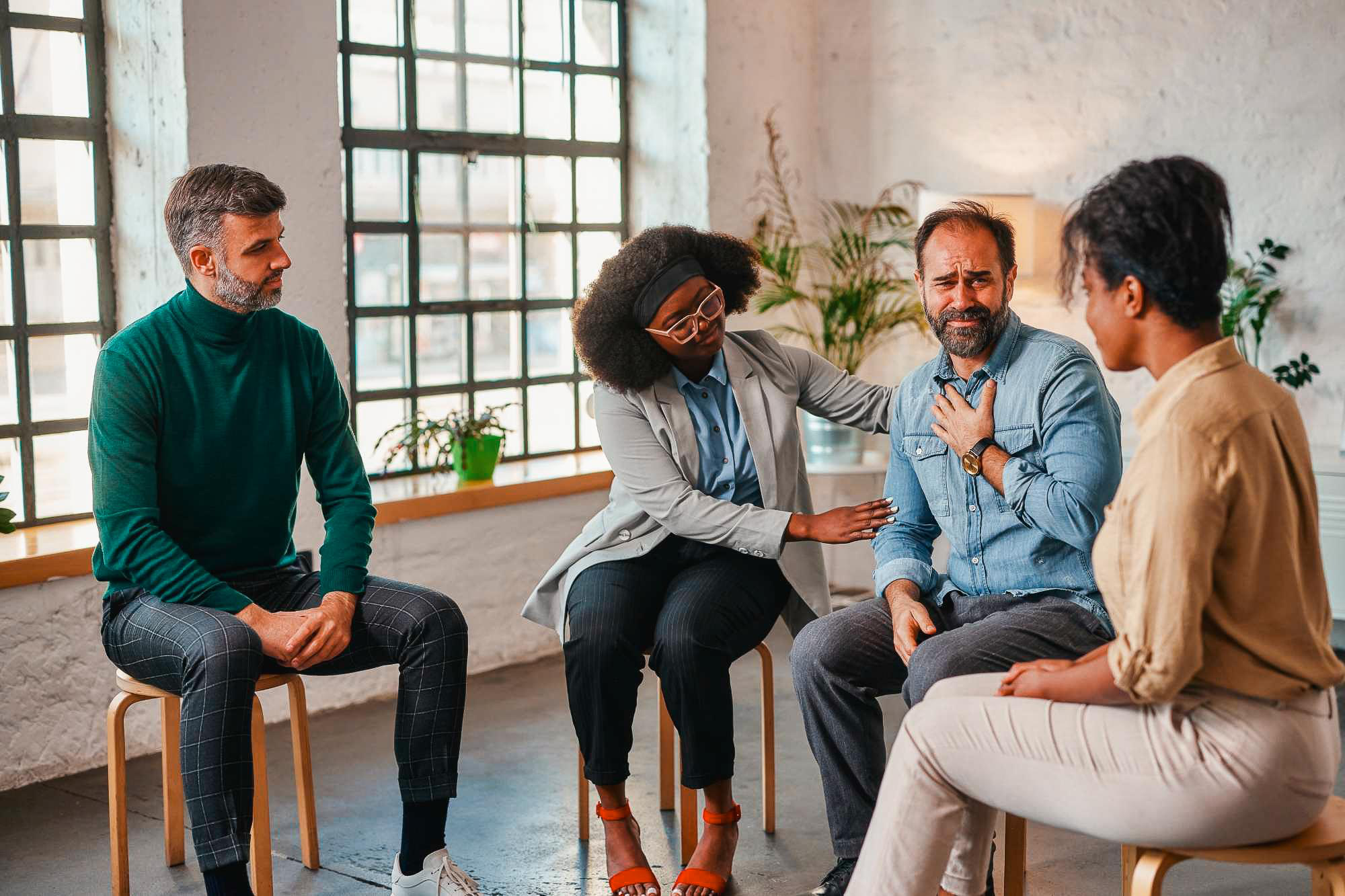 Adult speaking in a group session
