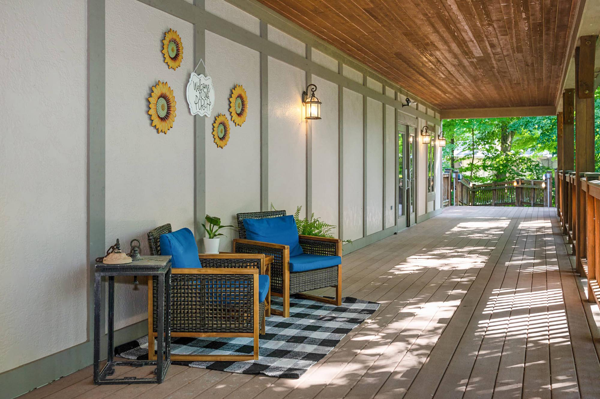 Recreational seating area on porch at Cedar Oaks Wellness