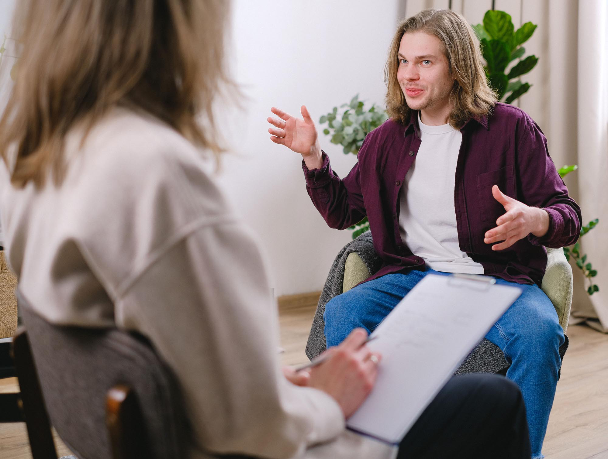 men speaking in a group session