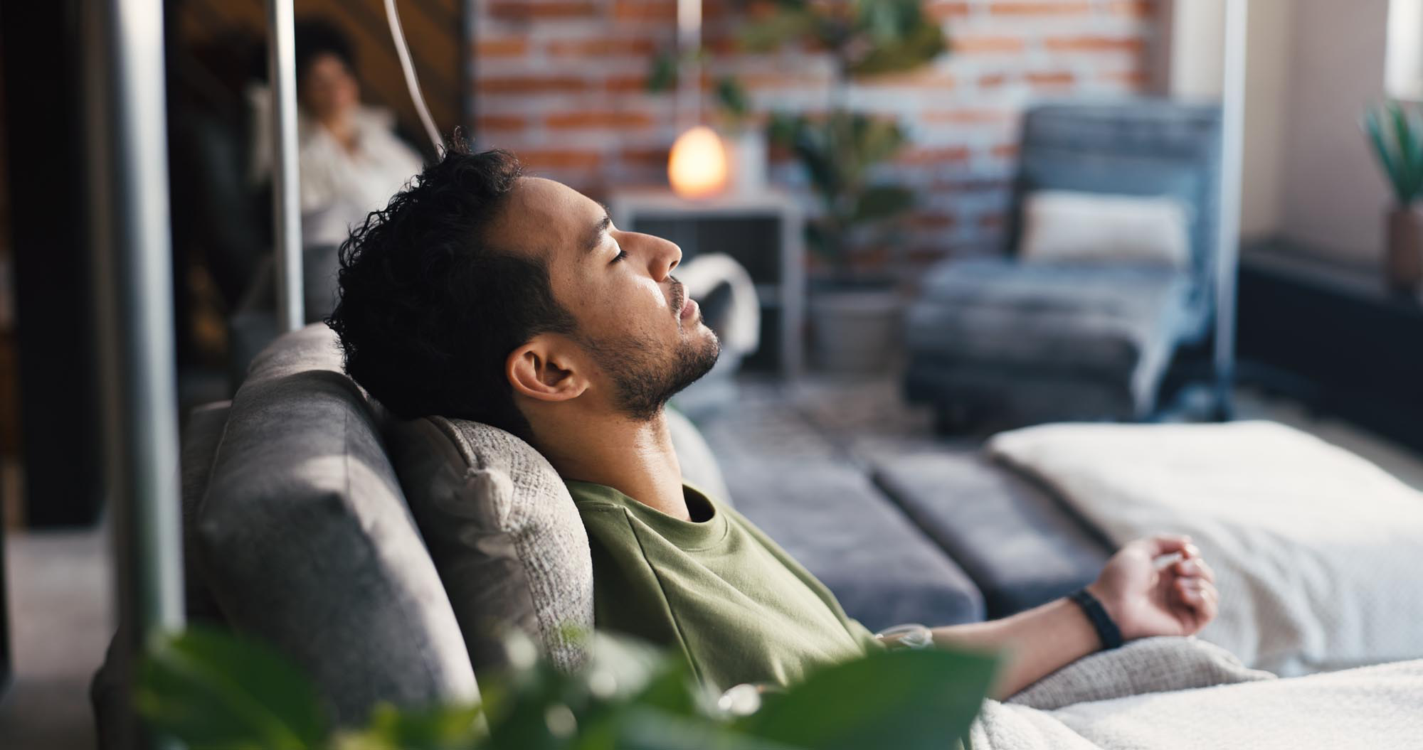 man talking with therapist about anxiety